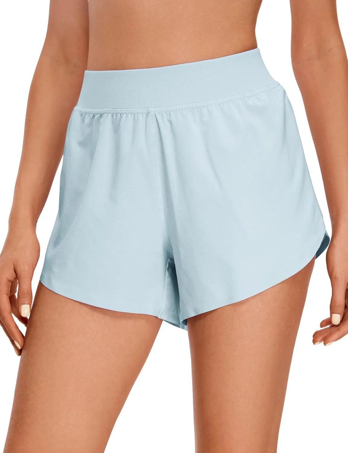 CRZ YOGA Mid Waisted Dolphin Athletic Shorts for Women 4" Lightweight High Split for Gym Workout with Liner Quick Dry